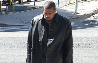 News Room Kanye West looks downcast as he heads