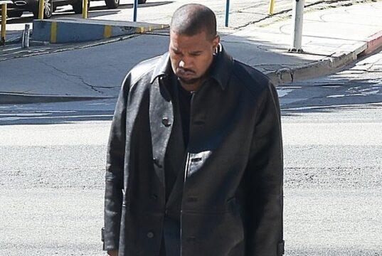 News Room Kanye West looks downcast as he heads