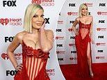 News Room : Tori Spelling, 52, puts on a busty display in racy corset gown at 2026 iHeartRadio Music Awards