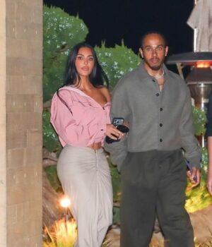 News Room Kim Kardashian looks smitten as she enjoys