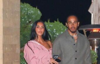 News Room Kim Kardashian looks smitten as she enjoys