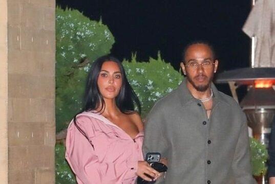 News Room Kim Kardashian looks smitten as she enjoys