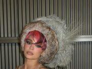 News Room Kylie Jenner models furry bikini top and