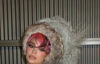 News Room Kylie Jenner models furry bikini top and