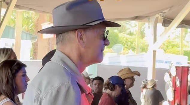 News Room Tom Hanks proudly sways along to son