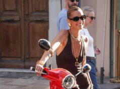 News Room : Bella Hadid turns heads in a plunging black dress as she steps out in Saint-Tropez during sun-soaked getaway