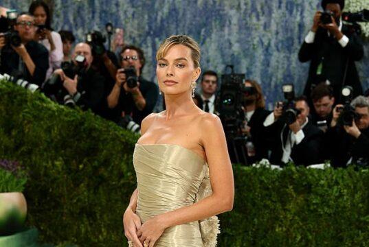 News Room Margot Robbies Chanel gown is branded the