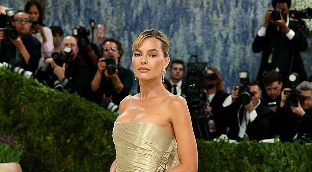 News Room Margot Robbies Chanel gown is branded the