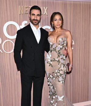 News Room : Jennifer Lopez nearly busts out of strapless floral gown as she cozies up to Brett Goldstein at Office Romance premiere in NYC… after addressing dating rumors News Room Jennifer Lopez nearly busts out of strapless